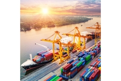 Container ship loading cargo at port